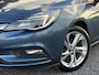 Opel Astra Sports Tourer 1.0 Innovation ✓1e Eigenaar✓Camera✓Trekhaak✓Carplay✓Navi✓Halfleder✓105pk✓Pdc V+A✓Recent beurt gehad✓Clima✓Cruise✓Rijstrooksensor✓N.A.P✓Apk tot 10-2027