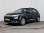 Hyundai Kona Electric EV COMFORT 64 kWh | SoH 95%! | PDC | 3 FASE | WARMTEPOMP | CAMERA | CLIMA | CRUISE ADAPT. | NAVI | PRIVACY GLASS | DAKRAILING | APPLE CAR PLAY & ADROID AUTO |