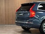 Volvo XC90 T8 AWD Recharge Plus Bright Long Range | Trekhaak | 360° Camera | Harman Kardon | 455pk | Adaptieve Cruise Control | Stoel en Stuurwielverwarming | Schuifdak | Full LED Meesturende koplampen | Google Infotainment | Pilot Assist | BLIS Dode Hoek Detectie | Standkachel met Volvo On Call App | Elektrische voorstoelen geheugen | Lederen bekleding | Zitting verlenging voorstoelen | Lederen dashboard | 20 Inch | Keyless Drive | Parkeersensoren voor+achter | Privacy Glass | Elektrisch bedienbare achterklep | 7-Persoons | 4-Zone Climate Control | Geïntegreerde zongordijnen achterportieren | Verlichte instaplijsten | Draadloos telefoon opladen | Alarm Klasse III | DAB Radio | Apple Carplay/Android Auto | Volvo On Call met mobiele App functie | Denim Blue Metallic |