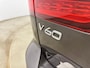 Volvo V60 T6 Recharge Ultra Dark | 18" | Trekhaak | Panoramadak | Head-Up | Full LED | Harman Kardon | Elektr. verst. Stoelen |