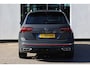 Volkswagen Tiguan 1.5 TSI R-Line Business+ 150PK / 110kW DSG, NL auto, nieuw door ons geleverd, 20" 'Suzuka' LMV, achteruitrijcamera (Rear View), parkeersensoren voor en achter (PDC), keyless start & entry, elektrische achterklep met sensorsturing (Easy Open), LED Matrix (IQ.Lights), digital cockpit pro, DAB+, Apple Carplay & Android Auto, navigatie, DAB+, draadloze telefoonlader, privacy glas, adaptieve crusie control (ACC), chrome dakrails, dynamische richtingaanwijzers, R-Line in- en exterieur, elektrisch verstel-, verwarm- en inklapbare buitenspiegels, verwarmbare voorstoel etc.