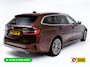 BMW 3-Serie Touring 320e Business Edition Plus | Camera | PDC V+A | Elec. achterklep | Cruise | Navigatie pro | Afn.Trekhaak Apple carplay/Android auto, Lederen bekleding, 18"LMV