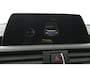 BMW 1-Serie 118i High Executive (STOELVERWARMING, CRUISE CONTROL, NAVIGATIE, PARKEERSENSOREN, DEALER ONDERHOUDEN)