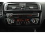 BMW 1-Serie 118i High Executive (STOELVERWARMING, CRUISE CONTROL, NAVIGATIE, PARKEERSENSOREN, DEALER ONDERHOUDEN)
