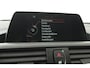 BMW 1-Serie 118i High Executive (STOELVERWARMING, CRUISE CONTROL, NAVIGATIE, PARKEERSENSOREN, DEALER ONDERHOUDEN)