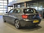 BMW 1-Serie 116i Upgrade Edition Open dak | Navigatie | Volleder | Trekhaak | Stoelverw.