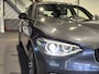 BMW 1-Serie 116i Upgrade Edition Open dak | Navigatie | Volleder | Trekhaak | Stoelverw.