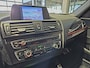 BMW 1-Serie 116i Upgrade Edition Open dak | Navigatie | Volleder | Trekhaak | Stoelverw.