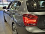 BMW 1-Serie 116i Upgrade Edition Open dak | Navigatie | Volleder | Trekhaak | Stoelverw.