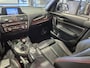 BMW 1-Serie 116i Upgrade Edition Open dak | Navigatie | Volleder | Trekhaak | Stoelverw.