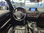 BMW 1-Serie 116i Upgrade Edition Open dak | Navigatie | Volleder | Trekhaak | Stoelverw.