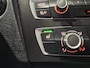 BMW 1-Serie 116i Upgrade Edition Open dak | Navigatie | Volleder | Trekhaak | Stoelverw.