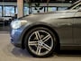 BMW 1-Serie 116i Upgrade Edition Open dak | Navigatie | Volleder | Trekhaak | Stoelverw.
