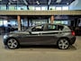 BMW 1-Serie 116i Upgrade Edition Open dak | Navigatie | Volleder | Trekhaak | Stoelverw.