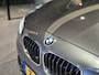 BMW 1-Serie 116i Upgrade Edition Open dak | Navigatie | Volleder | Trekhaak | Stoelverw.