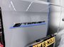 Ford E-Transit Custom 320 | L2 H1 | SPORT | 65 kWh | 301 KM RANGE WLTP | 2-ZITS | ADAPTIVE CRUISE CONTROL | LM VELGEN | SPOILER | PARKEERCAMERA | NAVIGATIE |