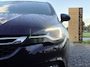Opel Astra Sports Tourer 1.4 Innovation ✓Trekhaak✓Camera✓Carplay✓Navi✓Recent beurt gehad✓150pk✓Keyless✓Halfleder✓6 Bak✓Rijstrooksensor✓Dodehoeksensor✓Pdc V+A✓Lm velgen✓Clima✓Cruise✓N.A.P✓Apk tot 09-2027