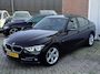 BMW 3-Serie 320i Luxury SPORT - Dealer onderhouden - LED