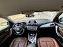 BMW 1-Serie 116i Business+ Automaat NAVI Clima Leer