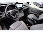 Volkswagen Transporter 2.5 eHybrid L2H1 30 Bulli 233PK / 171kW, Rondomzichtcamera (Area View), zijschuifdeur links + rechts met sluithulp, verwarmbare en elektrisch verstelbare ergonomische voorstoelen, Apple Carplay & Android Auto, achteruitrijcamera, dodehoekdetectie (Side Assist), verwarmbaar stuurwiel, elektrisch uitklapbare trekhaak, volledig digitaal instrumentenpaneel (Digital Cockpit), kunstlederen interieurdelen, draadloos telefoon laden, grootlichtassistent, 17'' LMV 'Monte Carlo' etc.