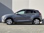 Hyundai Kona Electric EV Fashion 39 kWh / SOH 94% / Dealer onderhouden / CCS snelladen / Achteruitrijcamera / Warmtepomp / Head Up Display / Apple Carplay Android Auto / Draadloze telefoon lader / Krell Audio Systeem / Keyless Entry/Start /