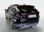 Hyundai Tucson 1.6 T-GDI PHEV Premium Sky 4WD | 66km WLTP elektrisch | Navigatie | Adaptive cruise control | Trekhaak | Apple Carplay & Android Auto | Dode hoek detectie | Draadloze telefoonlader |