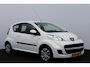 Peugeot 107 1.0-12V Millesim 200/ APK 10-2027!/ Airco/ C.V. Afstand/ Elek. Ramen/ Isofix/ Deelbare achterbank/ Radio-CD AUX/ Toerenteller/ Getint glas.