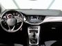 Opel Astra ST 105PK 120 Jaar Edition | 1ste eigenaar | Camera | Trekhaak | AppleCarPlay/Android | Armsteun | AGR stoelen | Navigatie | Climate Control | Cruise Control | Isofix | Privacy Glass | Parkeersensoren |