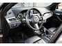 BMW X1 SDrive20i Orange Edition II, HUD, Groot navi, Leder, Afn. Trekhaak, Dealer onderhouden