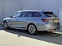 Skoda Octavia Combi 1.5 TSI MHEV Sportline / Fabrieksgarantie t/m 12-2026 / Adaptieve Cruise Control / Navigatie / Apple Carplay/Android Auto / Achteruitrijcamera / Stoelverwarming / Sportstoelen / Elektrische achterklep /