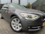 BMW 1-Serie 118i 170pk Sportline,Leer,Xenon,Navi,Clima,Cruise,Dealer OH