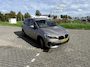 BMW 2-Serie Active Tourer 220i Business Edition Plus l Leder l Panoramadak l Stoelverwarming l Camera l Head up l Elekt. Klep l Full LED l