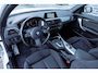 BMW 1-Serie 118i Edition M Sport Shadow Executive | Achteruitrijcamera | Parkeerassistent | Sportstoelen | LED Koplampen | Privacy Glas | Cruise Control | Lichtmetalen Velgen 18 inch | Navigatie Business