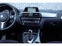 BMW 1-Serie 118i Edition M Sport Shadow Executive | Achteruitrijcamera | Parkeerassistent | Sportstoelen | LED Koplampen | Privacy Glas | Cruise Control | Lichtmetalen Velgen 18 inch | Navigatie Business