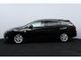 Opel Astra Sports Tourer 1.2 Elegance/ Trekhaak/ 16'' LMV/ LED Koplampen!/ Stoel + Stuurverw./ Camera/ Apple + Android/ Half-Leder/ Dode-Hoek DET./ Extra getint glas/ PDC V+A/ Navi/ Clima/ Cruise/ Bluetooth.