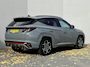 Hyundai Tucson 1.6 T-GDI PHEV N Line Sky 4WD / Trekhaak (1350 kg) / Elektrische achterklep / Rondomzicht camera / Stuur- Stoel & Achterbank verwarming / Adaptief cruise control / Keyless Entry/Start / Voorstoelen Geventileerd / Stoel Geheugen / Schuifkantel Dak /