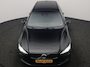Volvo V60 T6 Recharge AWD R-Design PHEV 340pk Dealer O.H. | SOH 82,8% | Camera | Harman / Kardon | Lederen Sportstoelen Memory & Verwarmd | Stuur Verwarmd | Keyless | BLIS | Cruise Control | Apple Carplay | Navigatie | DAB | 20"L.M | Plug In Hybrid