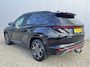 Hyundai Tucson 1.6 T-GDI HEV N-Line Business Sky | Trekhaak | All-season banden | Elektrisch glazen panorama-dak | Cruise Control Adaptief | Apple Carplay/Android Auto | Stoel en stuurverwarming |