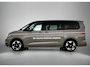 Volkswagen Multivan 1.5 eHybrid L1 Bulli Edition 4Motion 245PK | FACELIFT! | Automaat | Trekhaak | Elektrische Schuifdeuren | Elektrische Achterklep | Achteruirijcamera | Verwarmbare Voorstoelen | Verwarmbare Voorruit | Trekhaak | 7-Zits Vis-a-Vis | Multifunctioneel Stuurwiel | Verschuifbare Tafel | Adaptive Cruise Controle | Navigatie | IQ.Light | Glazen Panorama Dak |