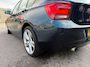 BMW 1-Serie 116i Upgrade Edition LEDER/CRUISE/WIDESCREEN/LMV/NAVI