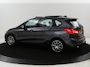 BMW 2-Serie Active Tourer 220i High Executive | Panoramdak | Leder | Trekhaak | Cruise control | Head-up | Stoelverwarming | Camera | Park assist | Navigatie | Bluetooth