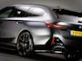 BMW 5-Serie Touring 550e xDrive M-Sport (MAXTON, 4-WIELBESTURING, PANO, HARMAN/KARDON, STOELVENTILATIE, HEAD-UP, SFEERVERLICHTING)