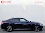 BMW i4 M50 High Executive M-Sport 84 kWh 'Tansanitblau' SOH 96% NL Auto! | 360 Camera | Hifi | DAB | Snelladen | Leer | Head-Up
