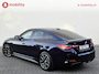 BMW i4 M50 High Executive M-Sport 84 kWh 'Tansanitblau' SOH 96% NL Auto! | 360 Camera | Hifi | DAB | Snelladen | Leer | Head-Up