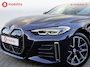BMW i4 M50 High Executive M-Sport 84 kWh 'Tansanitblau' SOH 96% NL Auto! | 360 Camera | Hifi | DAB | Snelladen | Leer | Head-Up