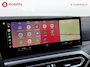 BMW i4 M50 High Executive M-Sport 84 kWh 'Tansanitblau' SOH 96% NL Auto! | 360 Camera | Hifi | DAB | Snelladen | Leer | Head-Up