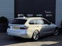 BMW 3-Serie Touring 320i High Executive | Panoramadak | Navigatie | Sportstoelen | Lichtmetalen Velgen |