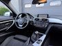 BMW 3-Serie Touring 320i High Executive | Panoramadak | Navigatie | Sportstoelen | Lichtmetalen Velgen |