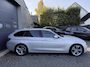 BMW 3-Serie Touring 320i High Executive | Panoramadak | Navigatie | Sportstoelen | Lichtmetalen Velgen |