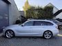 BMW 3-Serie Touring 320i High Executive | Panoramadak | Navigatie | Sportstoelen | Lichtmetalen Velgen |